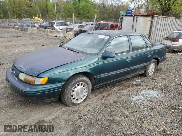 1995 Ford Taurus GL with VIN 1FALP52U8SA179395, listed as a Copart auction lot 53614265 with 71,082 mi miles and Salvage title. Bid and sale history available at DreamBid. Image 1.