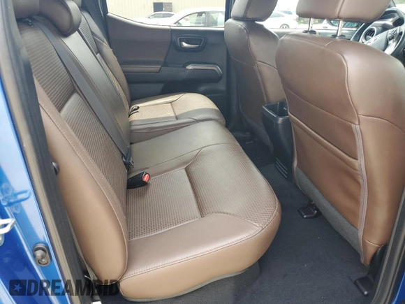 2018 Toyota Tacoma SR z VIN 3TMGZ5AN5JM148719, wystawiony jako Copart lot #56621065 z przebiegiem 34 433 mil mil oraz Szkoda całkowita • Salvage title. Historia ofert i sprzedaży dostępna na DreamBid. Obrazek 10.