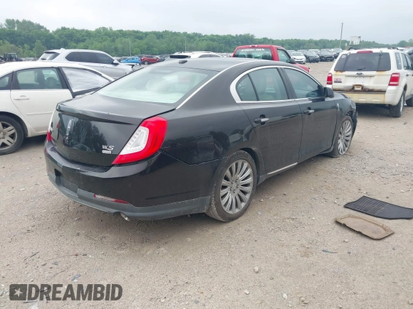 2013 Lincoln MKS z VIN 1LNHL9EK0DG600129, wystawiony jako IAAI lot #42314913 z przebiegiem 119 674 mil mil oraz . Historia ofert i sprzedaży dostępna na DreamBid. Obrazek 4.