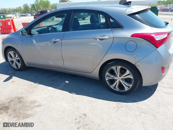 2013 Hyundai Elantra GT with VIN KMHD35LE9DU058163, listed as a IAAI auction lot 42067923 with 180,638 mi miles. Bid and sale history available at carsss.com. Image 6.