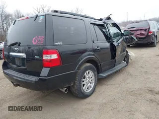 2014 Ford Expedition King Ranch with VIN 1FMJU1J59EEF05579, listed as a IAAI auction lot 41787316 with 129,675 mi miles and . Bid and sale history available at DreamBid. Image 4.