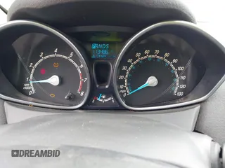2015 Ford Fiesta SE with VIN 3FADP4BJXFM135864, listed as a IAAI auction lot 39462016 with 113,486 mi miles and . Bid and sale history available at DreamBid. Image 7.