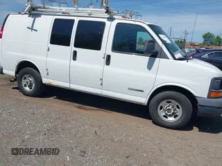 2006 GMC Savana Cargo with VIN 1GTGG25V661219848, listed as a IAAI auction lot 42142102 with 157,262 mi miles. Bid and sale history available at carsss.com. Image 1.