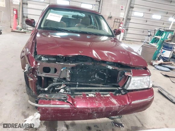 2004 Mercury Grand Marquis GS with VIN 2MEFM74W44X660876, listed as a IAAI auction lot 41915559 with 138,546 mi miles. Bid and sale history available at carsss.com. Image 12.