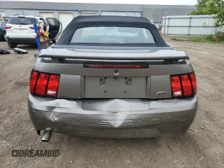 2002 Ford Mustang Deluxe с VIN 1FAFP44422F128062, выставлен на аукционе Copart как лот 57081075 с пробегом 85 392 миль миль и Чистый • Clean title. История ставок и продаж доступна на DreamBid. Изображение 6.