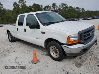 2001 Ford F-350 XL with VIN 3FTSW30F51MA57578, listed as a Copart auction lot 80559194 with 153,985 mi miles and Salvage Title. Bid and sale history available at DreamBid. Image 4.