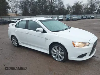 2015 Mitsubishi Lancer GT with VIN JA32U8FW5FU008618, listed as a IAAI auction lot 41290204 with 115,854 mi miles. Bid and sale history available at carsss.com. Image 1.