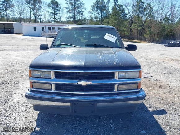 1999 Chevrolet Suburban with VIN 3GNEC16R0XG137834, listed as a IAAI auction lot 41853492 with 296,147 mi miles. Bid and sale history available at carsss.com. Image 12.