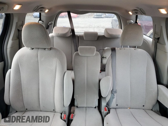 2012 Toyota Sienna with VIN 5TDKA3DC0CS014719, listed as a Copart auction lot 88358865 with 118,901 mi miles and Salvage Title. Bid and sale history available at DreamBid. Image 10.