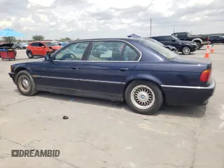 1997 BMW 7 Series 740il with VIN WBAGJ8324VDM02317, listed as a Copart auction lot 64879564 with 107,365 mi miles and Salvage Title. Bid and sale history available at carsss.com. Image 2.