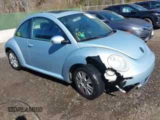 2010 Volkswagen New Beetle Coupe with VIN 3VWRW3AG2AM018644, listed as a IAAI auction lot 41815380 with 99,738 mi miles. Bid and sale history available at carsss.com. Image 1.