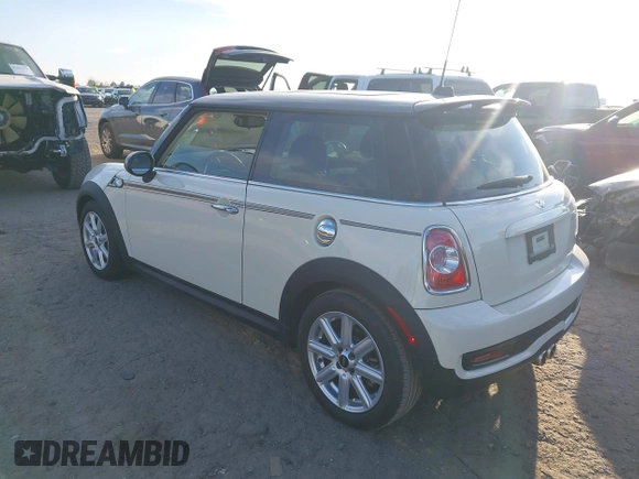 2013 MINI Hardtop S with VIN WMWSV3C53DT479714, listed as a IAAI auction lot 41685283 with 61,904 mi miles and . Bid and sale history available at DreamBid. Image 3.