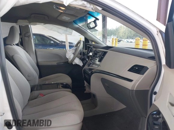 2014 Toyota Sienna LE AAS with VIN 5TDKK3DC4ES505293, listed as a IAAI auction lot 42021409 with 70,319 mi miles. Bid and sale history available at carsss.com. Image 5.