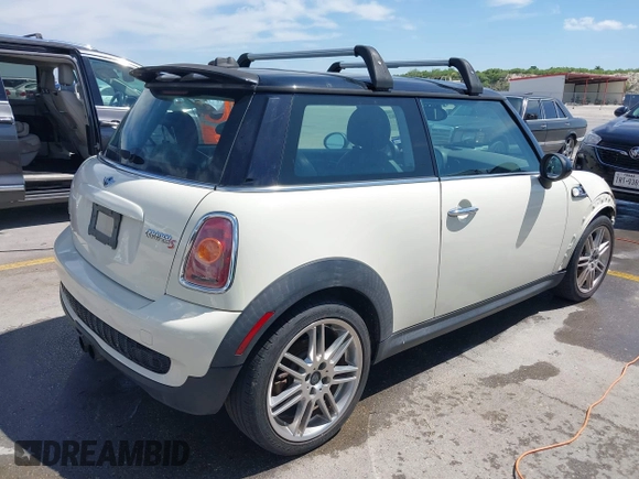 2007 MINI Hardtop S with VIN WMWMF73567TL89619, listed as a IAAI auction lot 42807828 with 201,371 mi miles and . Bid and sale history available at DreamBid. Image 4.