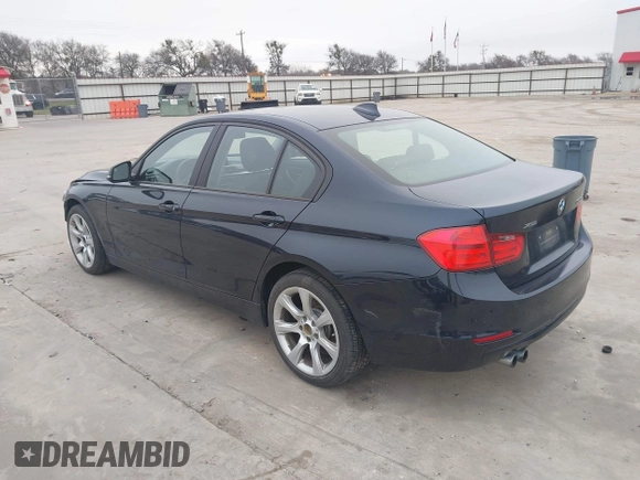 2015 BMW 3 Series 328i xDrive with VIN WBA3B3C54FJ984107, listed as a IAAI auction lot 41565829 with 98,557 mi miles and . Bid and sale history available at DreamBid. Image 3.