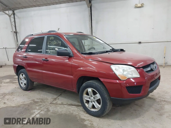 2009 Kia Sportage LX with VIN KNDJE723497555026, listed as a IAAI auction lot 42102679 with 136,398 mi miles. Bid and sale history available at carsss.com. Image 1.