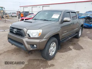 2013 Toyota Tacoma with VIN 3TMLU4EN6DM118537, listed as a IAAI auction lot 41824193 with 158,504 mi miles and . Bid and sale history available at DreamBid. Image 2.