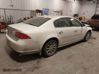 2010 Buick Lucerne CXL Premium with VIN 1G4HJ5EM9AU130504, listed as a IAAI auction lot 41328541 with 190,537 mi miles. Bid and sale history available at carsss.com. Image 4.