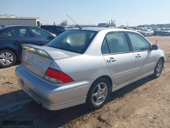 2003 Mitsubishi Lancer OZ-Rally with VIN JA3AJ86E23U069464, listed as a IAAI auction lot 41775000 with 148,735 mi miles. Bid and sale history available at carsss.com. Image 4.