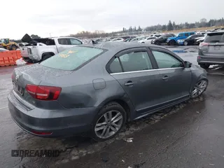 2017 Volkswagen Jetta SEL with VIN 3VWL17AJ1HM211546, listed as a IAAI auction lot 41502402 with 52,030 mi miles and . Bid and sale history available at DreamBid. Image 6.