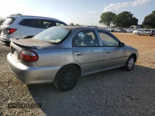 2001 Kia Sephia z VIN KNAFB121715014673, wystawiony jako Copart lot #71712174 z przebiegiem 83 277 mil mil oraz Szkody całkowita. Historia ofert i sprzedaży dostępna na DreamBid. Obrazek 3.