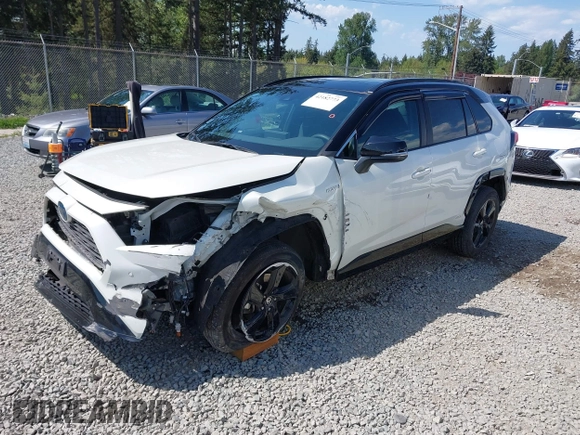 2021 Toyota RAV4 Hybrid XSE with VIN 4T3E6RFV9MU040817, listed as a IAAI auction lot 42182773 with 39,438 mi miles and . Bid and sale history available at DreamBid. Image 2.