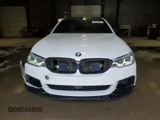 2018 BMW 5 Series M550i xDrive with VIN WBAJB9C5XJB035514, listed as a Copart auction lot 50045425 with 76,325 mi miles and Salvage Title. Bid and sale history available at carsss.com. Image 5.