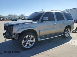 2003 Cadillac Escalade z VIN 1GYEK63N93R275144, wystawiony jako Copart lot #46793825 z przebiegiem 185 125 mil mil oraz Szkody całkowita. Historia ofert i sprzedaży dostępna na DreamBid. Obrazek 1.