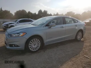 2014 Ford Fusion SE Hybrid with VIN 3FA6P0LU4ER106386, listed as a Copart auction lot 59627565 with 105,855 mi miles and Salvage title. Bid and sale history available at DreamBid. Image 1.