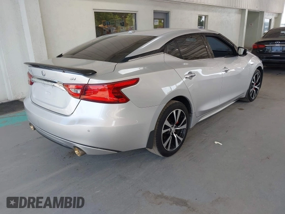 2018 Nissan Maxima SL with VIN 1N4AA6AP2JC385180, listed as a IAAI auction lot 42340264 with 115,736 mi miles and . Bid and sale history available at DreamBid. Image 4.