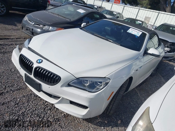 2018 BMW 6 Series 640i with VIN WBA6F1C5XJGT83781, listed as a IAAI auction lot 41945616 with 46,370 mi miles and . Bid and sale history available at carsss.com. Image 2.