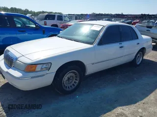 2000 Mercury Grand Marquis LS z VIN 2MEFM75W3YX689323, wystawiony jako IAAI lot #42019687 z przebiegiem 241 045 mil mil oraz . Historia ofert i sprzedaży dostępna na DreamBid. Obrazek 17.