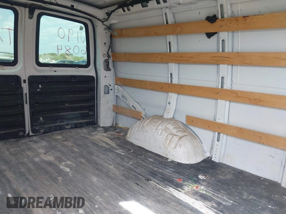 2018 Chevrolet Express Cargo Van with VIN 1GCWGAFG8J1906084, listed as a IAAI auction lot 41814922 with 162,977 mi miles. Bid and sale history available at carsss.com. Image 8.