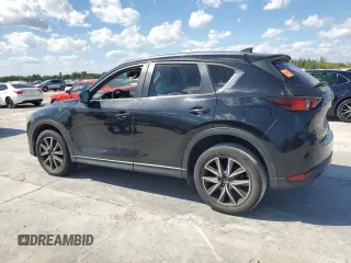 2018 Mazda CX-5 Touring with VIN JM3KFACM0J1408075, listed as a Copart auction lot 50866735 with Not Provided miles and Salvage Title. Bid and sale history available at carsss.com. Image 2.