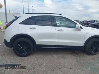 2019 Cadillac XT4 FWD Sport with VIN 1GYFZER45KF224300, listed as a IAAI auction lot 40949318 with 57,705 mi miles. Bid and sale history available at carsss.com. Image 13.