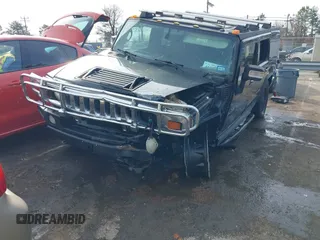 2006 Hummer H2 with VIN 5GRGN23U06H113353, listed as a IAAI auction lot 41476649 with 165,370 mi miles. Bid and sale history available at carsss.com. Image 6.