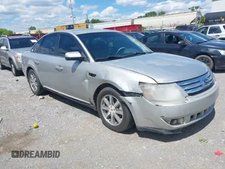 2008 Ford Taurus SEL z VIN 1FAHP24W28G186822, wystawiony jako IAAI lot #42173076 z przebiegiem 243 849 mil mil oraz . Historia ofert i sprzedaży dostępna na DreamBid. Obrazek 1.