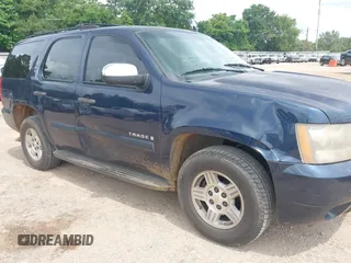 2007 Chevrolet Tahoe LS with VIN 1GNFC13CX7R264532, listed as a IAAI auction lot 42425650 with 254,286 mi miles and . Bid and sale history available at DreamBid. Image 6.