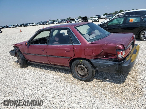1991 Toyota Camry DLX z VIN 4T1SV21E4MU332100, wystawiony jako Copart lot #64645474 z przebiegiem 164 143 mil mil oraz Czysty tytuł • Clean title. Historia ofert i sprzedaży dostępna na DreamBid. Obrazek 2.