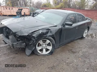 2014 Dodge Charger SE with VIN 2C3CDXBG4EH210130, listed as a IAAI auction lot 40908216 with Not Provided miles and . Bid and sale history available at DreamBid. Image 2.