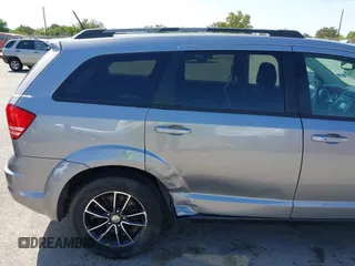 2017 Dodge Journey SE z VIN 3C4PDCAB1HT573511, wystawiony jako IAAI lot #41984865 z przebiegiem 128 721 mil mil oraz . Historia ofert i sprzedaży dostępna na DreamBid. Obrazek 6.