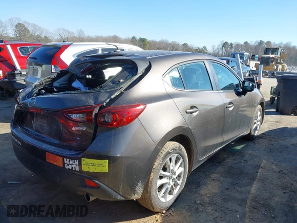 2014 Mazda 3 i Touring with VIN JM1BM1L70E1109815, listed as a IAAI auction lot 41611536 with 98,860 mi miles and . Bid and sale history available at DreamBid. Image 4.