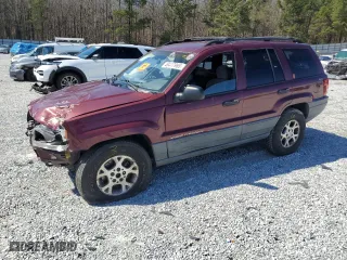 2001 Jeep Grand Cherokee Laredo with VIN 1J4GW48S21C659976, listed as a Copart auction lot 49417965 with 227,644 mi miles and Salvage Title. Bid and sale history available at carsss.com. Image 1.