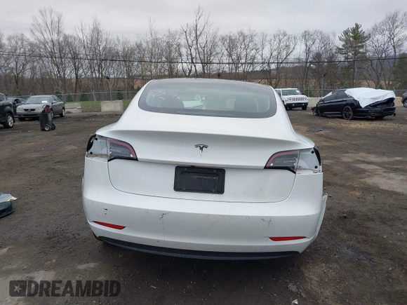 2020 Tesla Model 3 Standard Range Plus with VIN 5YJ3E1EA7LF659172, listed as a IAAI auction lot 42017026 with 32,104 mi miles. Bid and sale history available at carsss.com. Image 16.