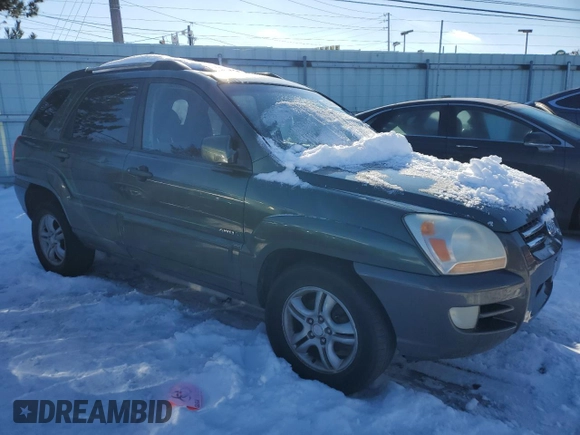 2005 Kia Sportage LX with VIN KNDJE723957107441, listed as a Copart auction lot 41530635 with 146,045 mi miles and Salvage Title. Bid and sale history available at carsss.com. Image 4.