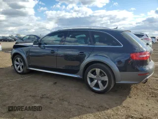 2014 Audi allroad Premium Plus with VIN WA1UFAFL0EA131822, listed as a Copart auction lot 76324684 with 73,048 mi miles and Salvage Title. Bid and sale history available at carsss.com. Image 2.