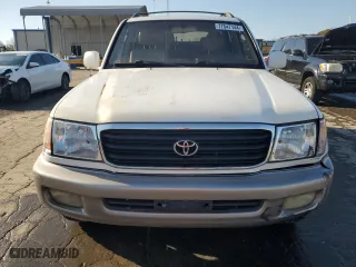 1999 Toyota Land Cruiser with VIN JT3HT05J8X0049750, listed as a Copart auction lot 77547144 with 168,435 mi miles and Salvage Title. Bid and sale history available at carsss.com. Image 5.