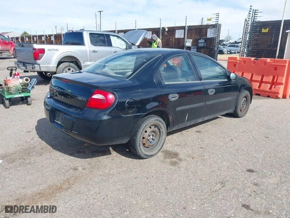 2004 Dodge Neon SE with VIN 1B3ES26C14D557254, listed as a IAAI auction lot 41906730 with 235,092 mi miles. Bid and sale history available at carsss.com. Image 4.