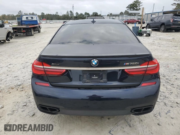 2019 BMW 7 Series M760i xDrive with VIN WBA7H6C51KG615276, listed as a Copart auction lot 79597234 with 39,195 mi miles and Salvage Title. Bid and sale history available at carsss.com. Image 6.