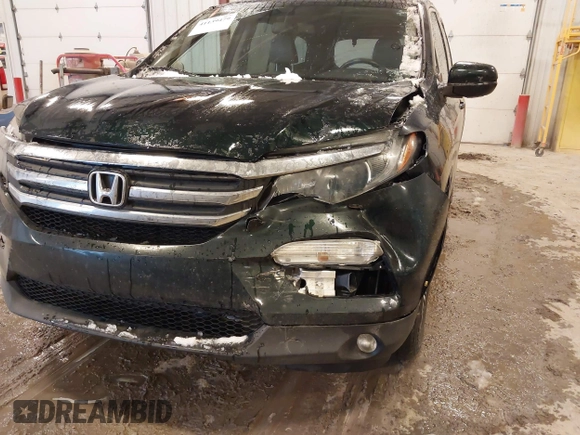 2016 Honda Pilot EX-L with VIN 5FNYF6H58GB012753, listed as a IAAI auction lot 41139479 with 175,842 mi miles and . Bid and sale history available at DreamBid. Image 6.